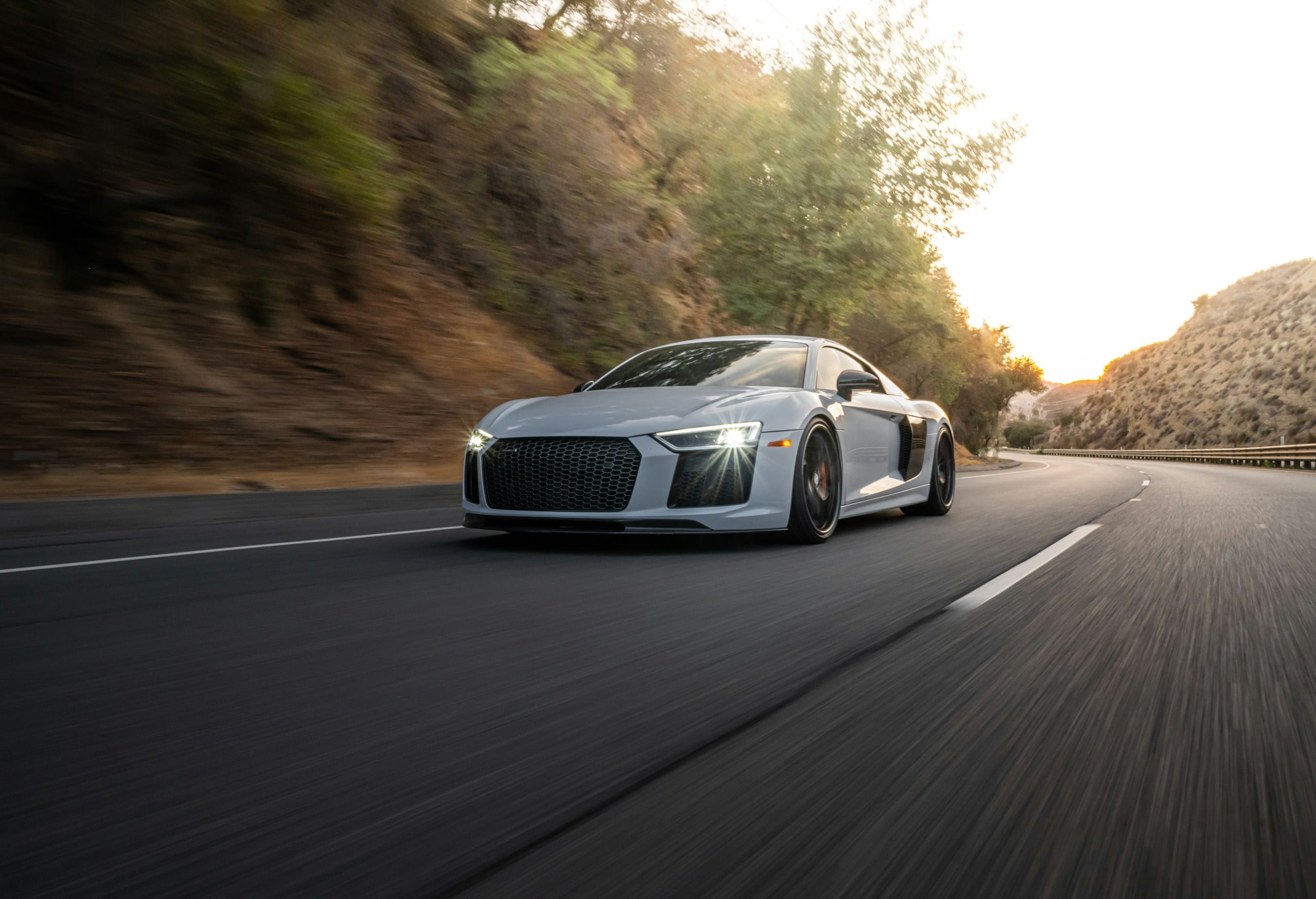 Silver Audi R8 on a sunny road: Audi Windshield Replacement, Blue Chip Auto Glass