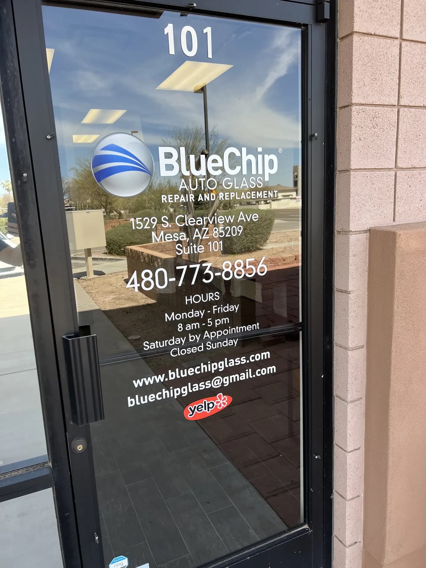Front door of the Mesa Blue Chip Auto Glass shop, Suite 101