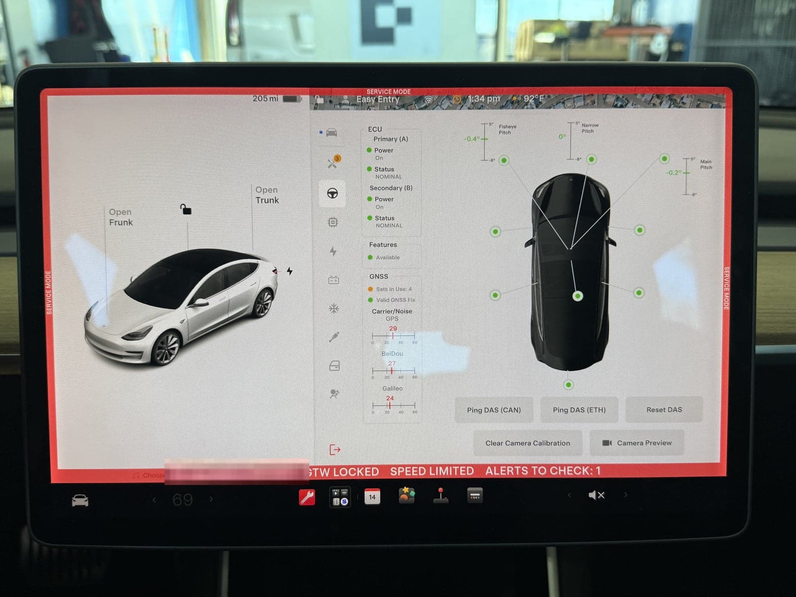 Tesla Service Mode screen showing the pitch readings of the three forward cameras after calibration