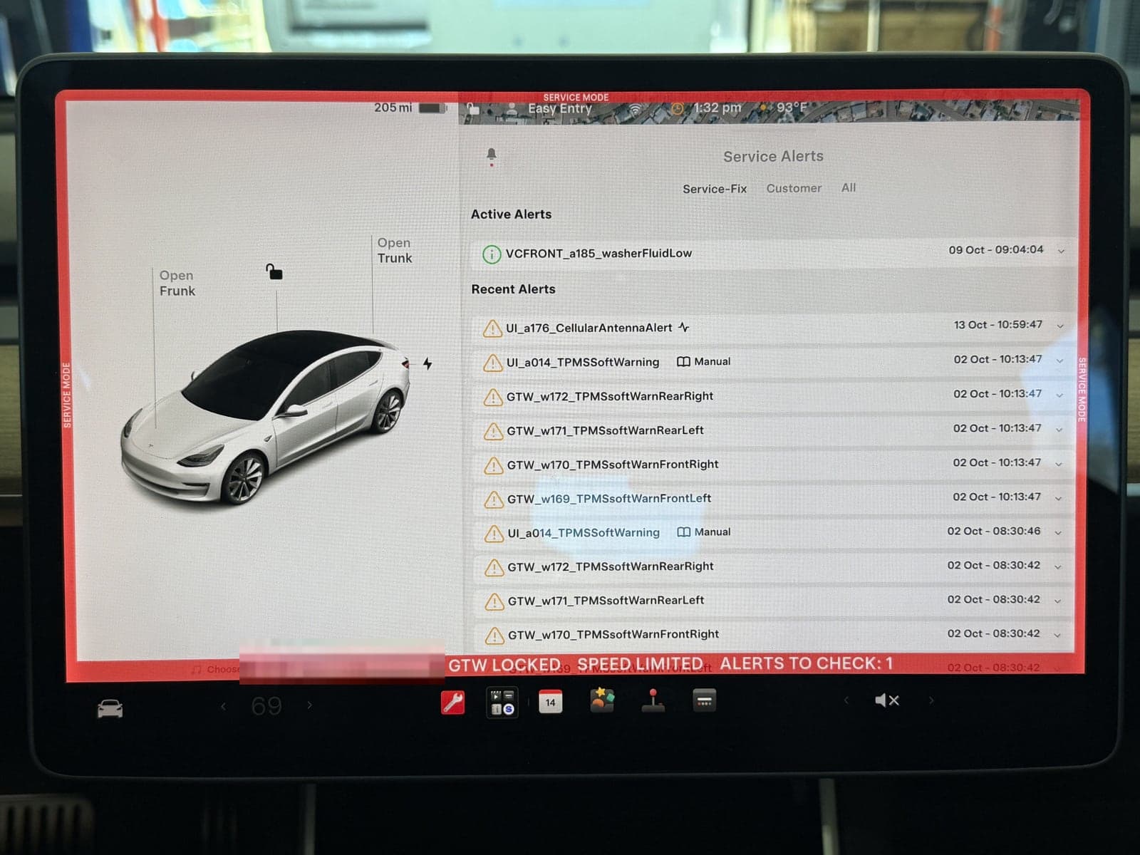 Tesla Service Mode Service Alerts screen photographed as the pre-scan before work begins